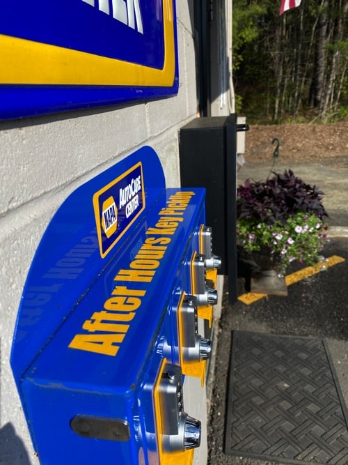 Collinsville Auto is a Napa Auto Care Center. Pictured are our Napa sign and after hours key pickup box.