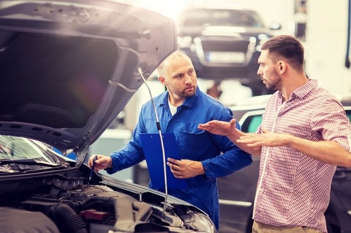 Customer asks mechanic question about car