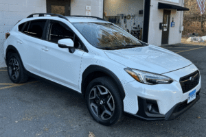 Subaru maintenance, auto repair in Canton, CT, at Collinsville Auto Repair. Image of a Subaru Crosstrek outside the shop, highlighting professional maintenance services that help improve reliability, extend vehicle life, and keep drivers safe on the road.